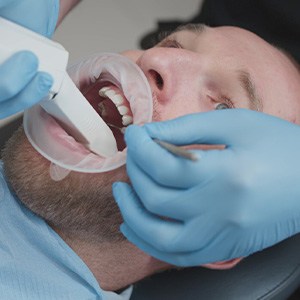 A man having digital dental impressions made